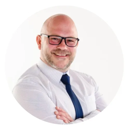 Personal estate agents finding success with Rello's sales progression app and services | Image: UK estate agent Chris Durant in white shirt and tie